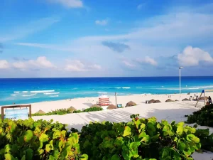 Playa Delfines in Cancun with white sand and turquoise Caribbean water